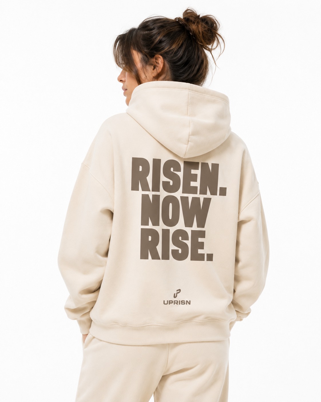 Model wearing UPRISN Christian hoodie in Cream, back print