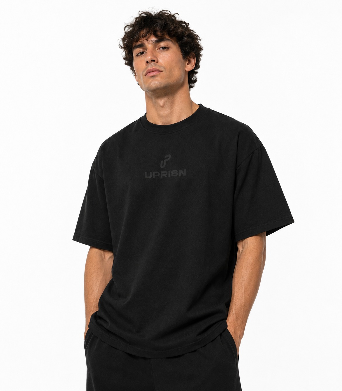 Model wearing UPRISN Christian tee in Black, front
